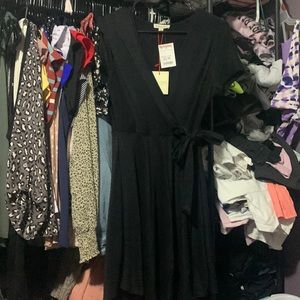 Black rolla coster dress new with tags, never worn.